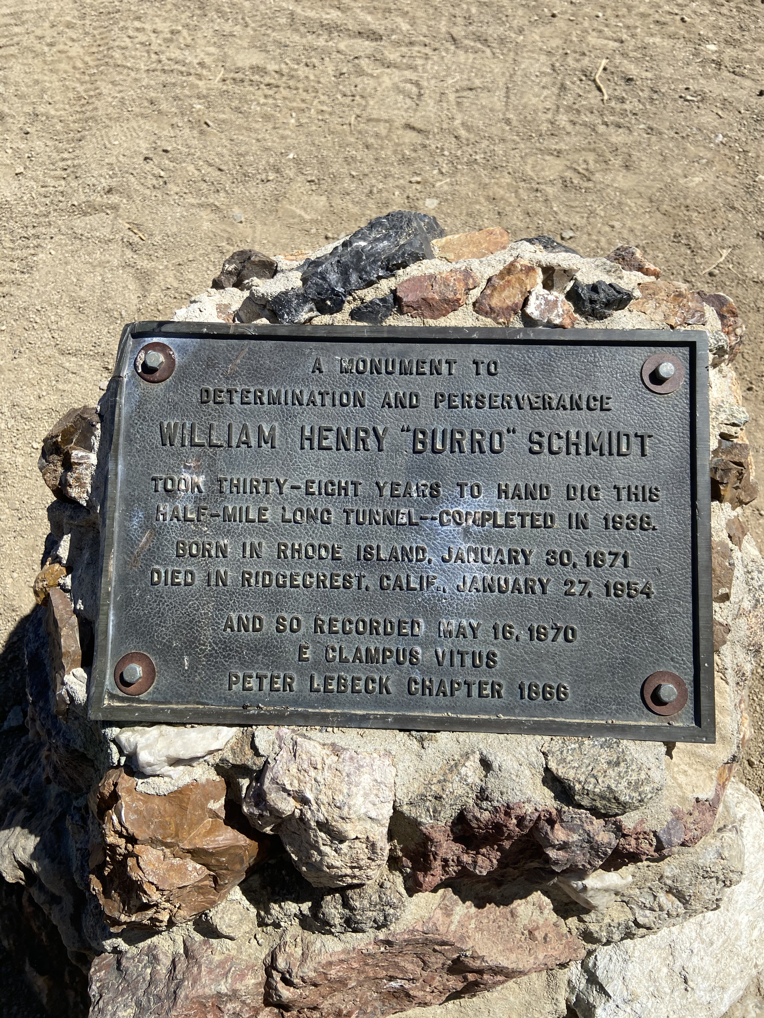 A metal plaque to commemorate William Henry "Burro" Schmidt.